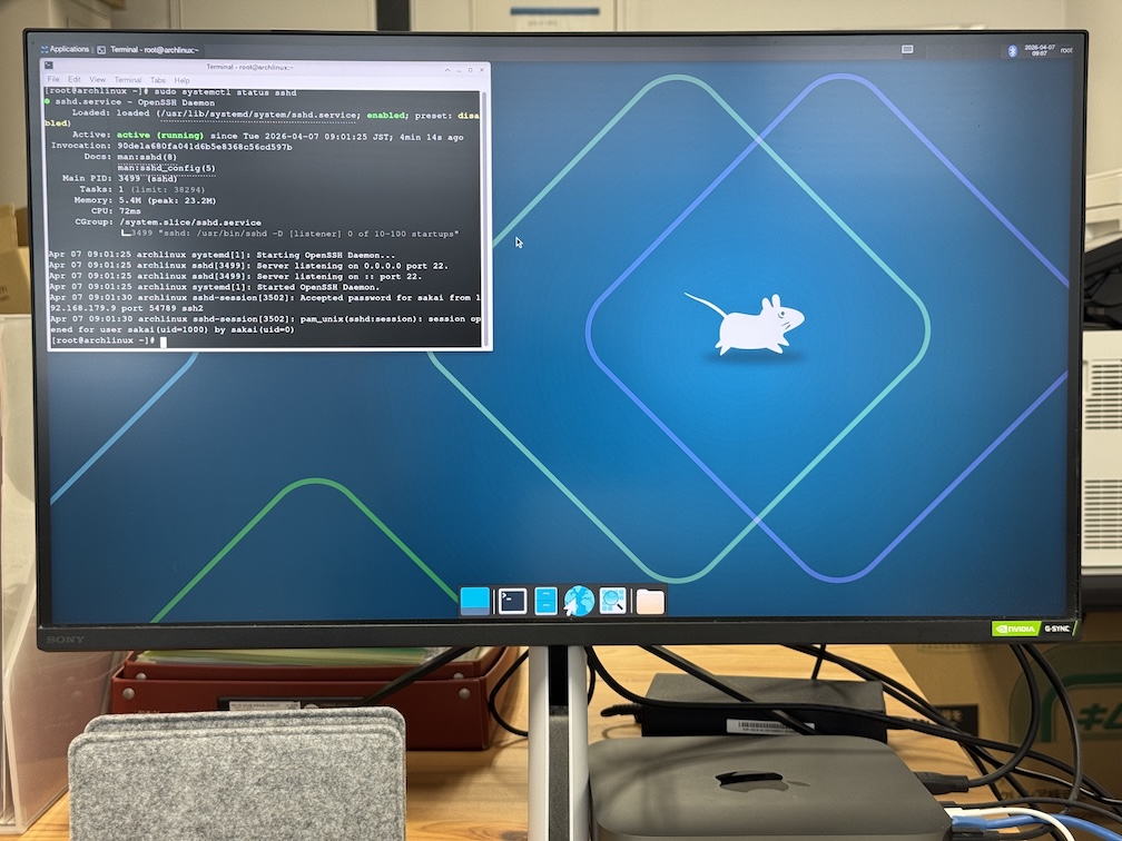 Successful Arch Linux installation on T2 Intel Mac mini showing terminal and systemd status